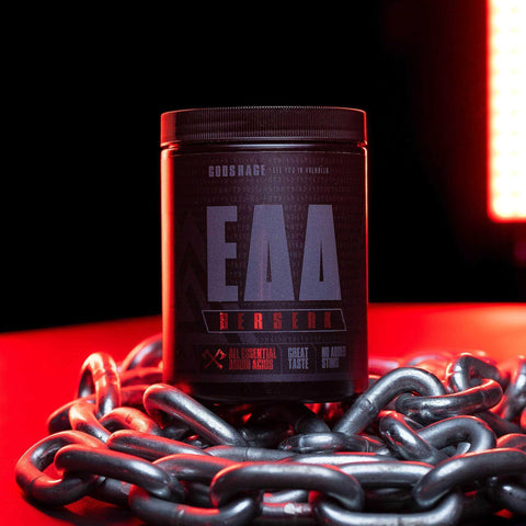 Berserk EAAs container of essential amino acids supplement for muscle growth and hydration surrounded by heavy metal chains on red background